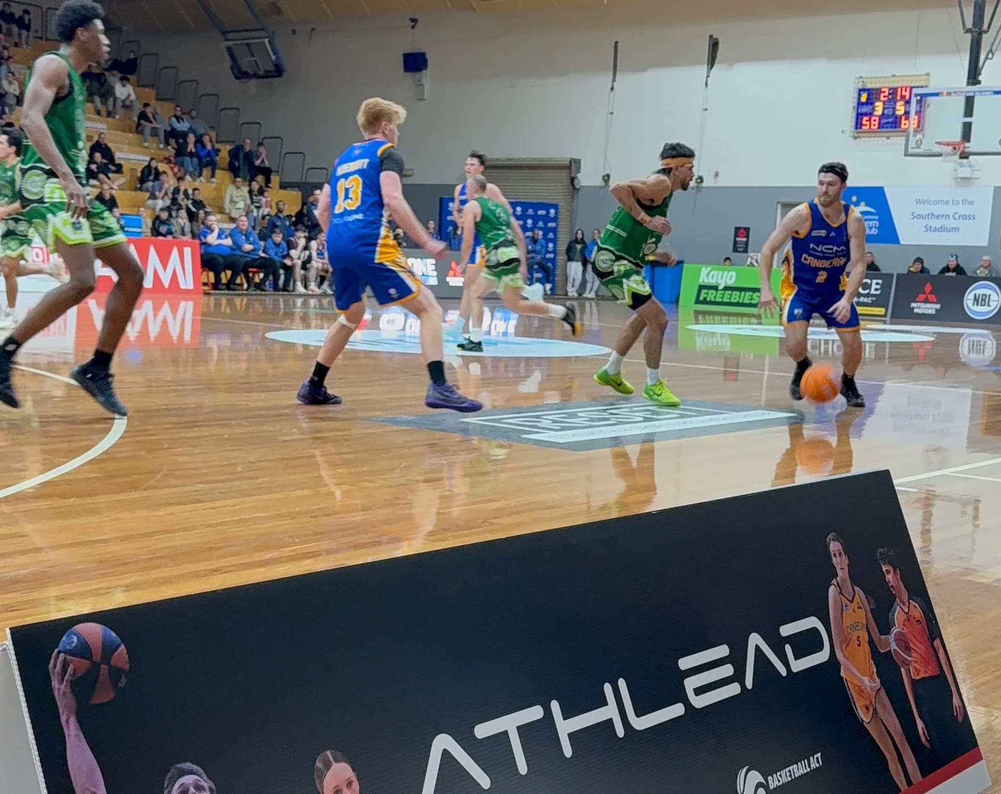 Athlead courtside at a basketball game